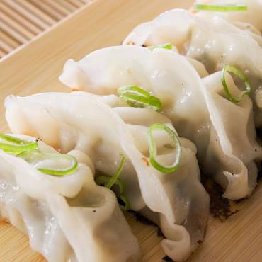 Pork and Green Onion Dumplings with Sesame Dipping Sauce